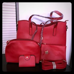 New red purse with lots of accessories.